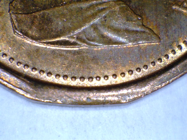 NY-First-12-Sided-Canadian-Cent-Clip